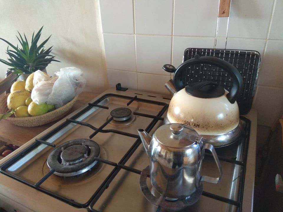 Sigal makes tea with herbs from her garden in Israel